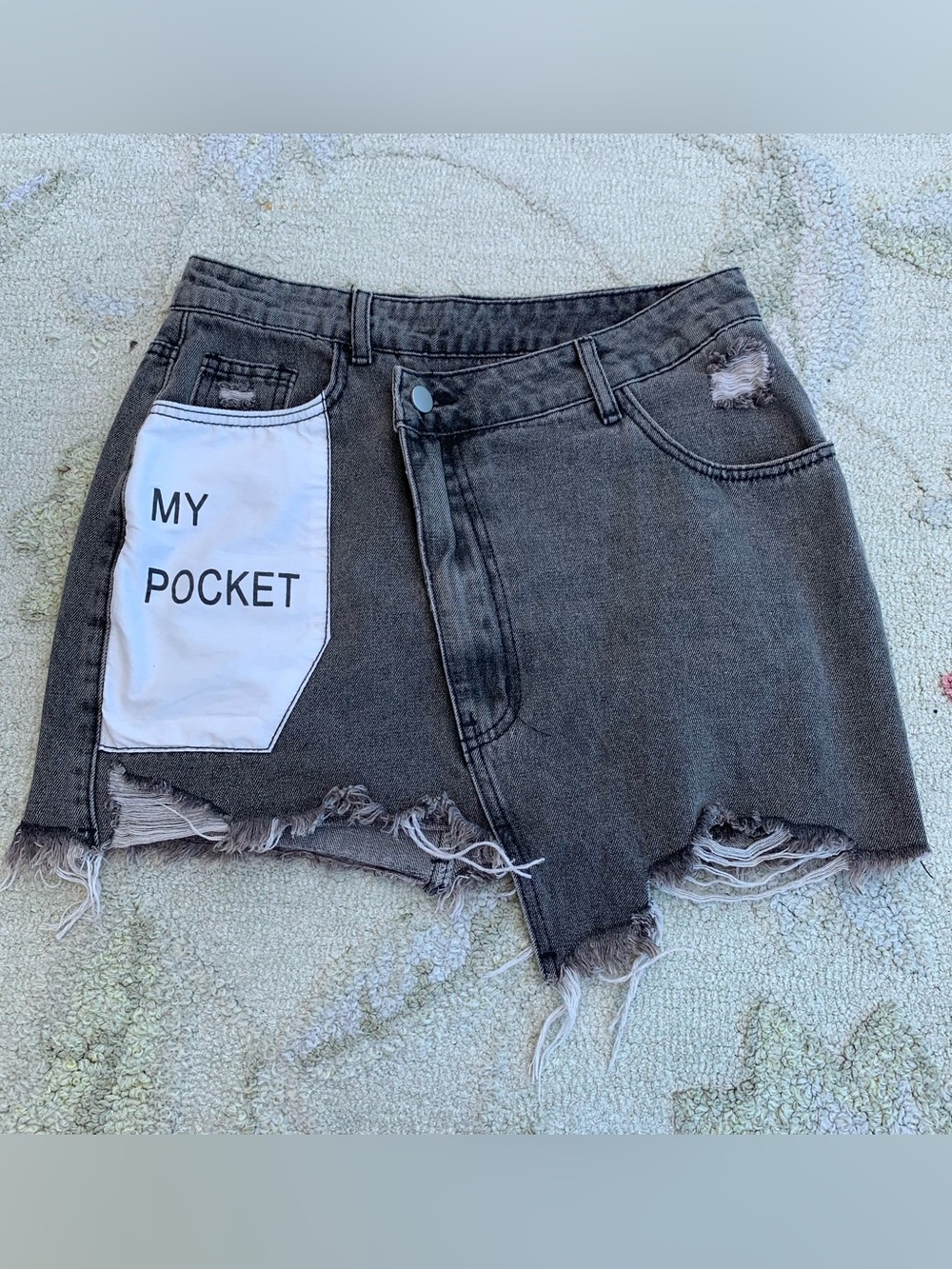Micas Asymmetrical Distressed Denim Skirt
Size Small (S)